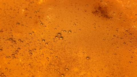 Close up of Light Beer with Bubbles Vídeos de archivo 125398491