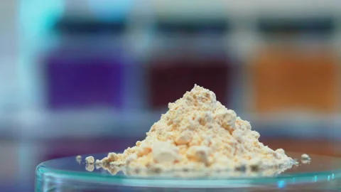 Close up light brown powder in lab pan left to right Vídeos de archivo 156167653