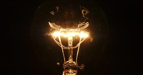 Close up of Light bulb with funny supply electricty Stock Footage 162619649