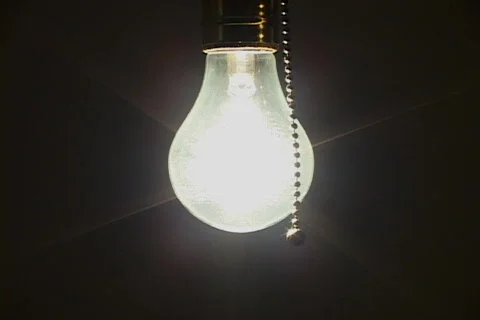 Close up of light bulb turned off Stock Footage