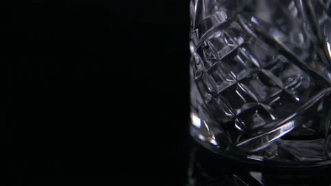 Close Light Off Empty Traditional Whiskey Glass Stock Footage 140764233