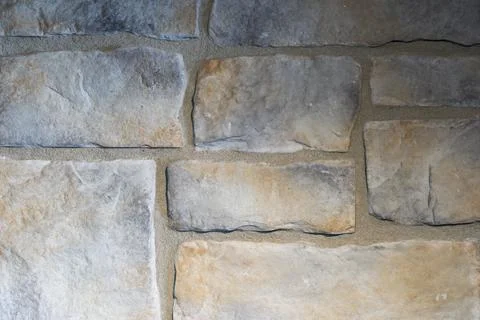 Close-Up of Light Gray and Beige Stone Veneer Wall Texture with Natural Mas.. Stock Photos