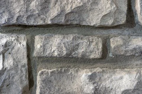 Close-Up of Light Gray Limestone Wall Texture with Rustic Stone Masonry Stock Photos