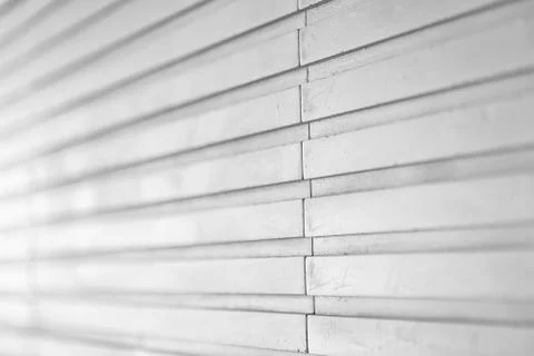 A close up of light gray wall tile Stock Photos