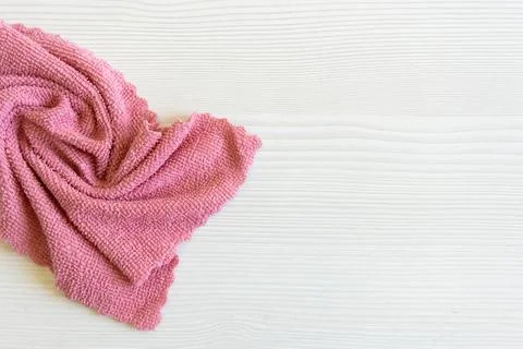 Close up light pink microfiber texture. Cleaning rag fluffy cloth on the table Stock Photos