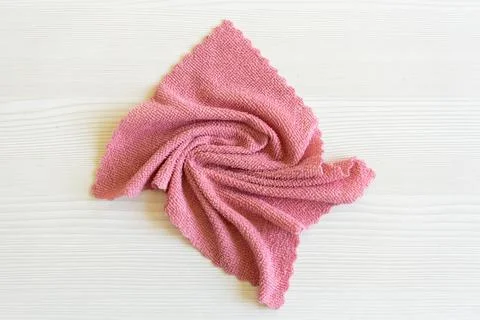 Close up light pink microfiber texture on the table. Cleaning rag fluffy cloth Stock Photos