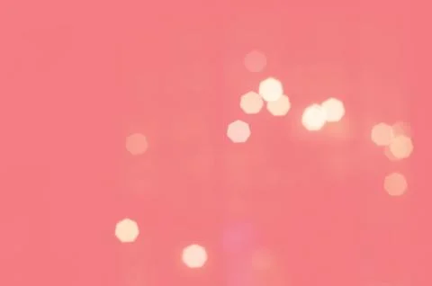 Close up of light spark on pink background Stock Photos