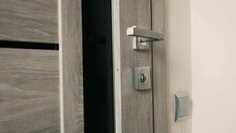 Close up of light switch and door handle wipe with antiseptic. Disinfection from Stock Footage 149960759