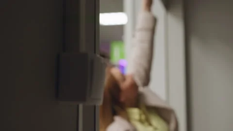 Close Up Light Switch In Dim Corridor As Person Walks Out Stock Footage 318838456