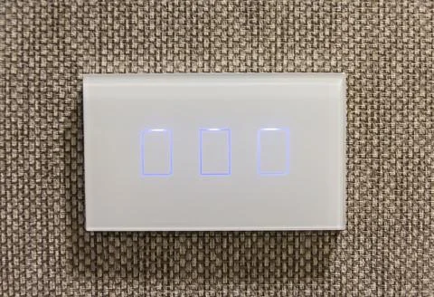 Close up of light switch, Modern switch light device on the wall Stock Photos
