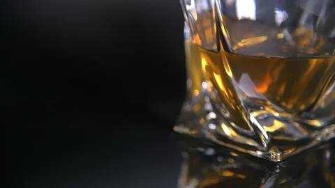 Close Light Turning Off Full Modern Whiskey Glass Stock Footage 140819351