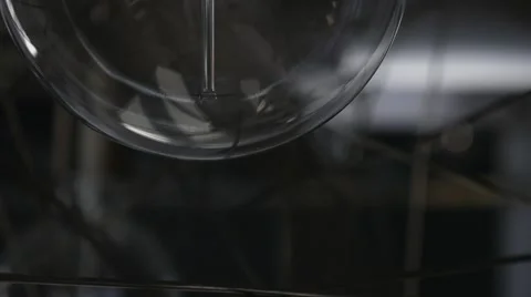 Close up of lightbulb in the modern metal lamp. Stock Footage 62018459