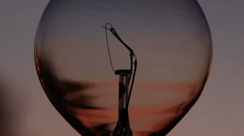 Close up of lightbulb as sunlight disappears 動画素材 48118502