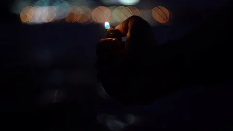 Close-up of a lighter in the hand Stock Footage 229342087