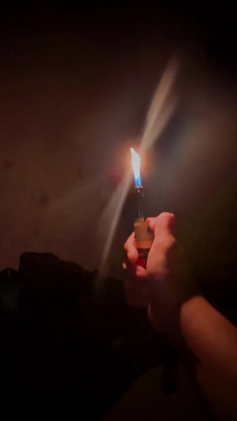 Close up lighter ignition. ignite of gas lighter in a dark Video stock 300172295