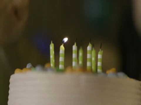 Close Up Lighting Birthday Candles Stock Footage 76415598