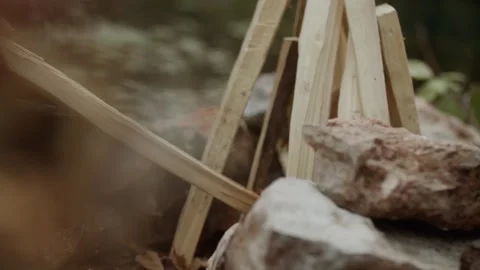 Close-up, lighting a fire. Firewood is burning Stock Footage 317215012