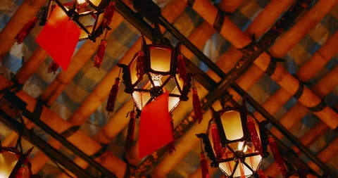 Close up of lights and lanterns Burning Buddhist Temple Religious Mysterious Bea Stock Footage 201096464