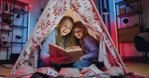 Close up of likable joyful friendly two sisters of different ages which spending Stock Footage 162094714