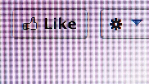 Close up of liking a Facebook page Stock Footage 88488144