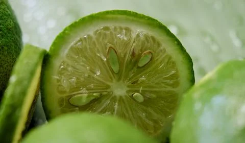 A close-up of a lime cut in half Stock Photos