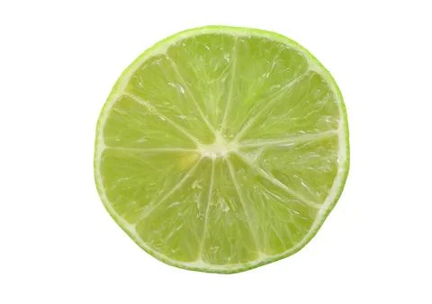 Close up of Lime cut piece isolated on a white background with clipping path. Stock Photos