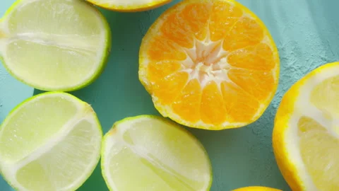 Close-up of lime, lemon, tangerine and orange citrus family fruits Stock Footage 290411609