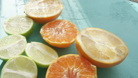 Close-up of lime, lemon, tangerine and orange citrus family fruits Stock Footage 292836971