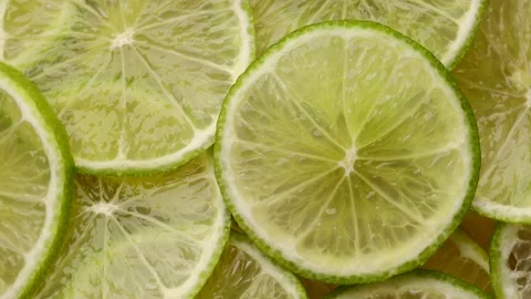 Close up of lime slices, rotation in circle. lime green Turning Stock Footage 233288642