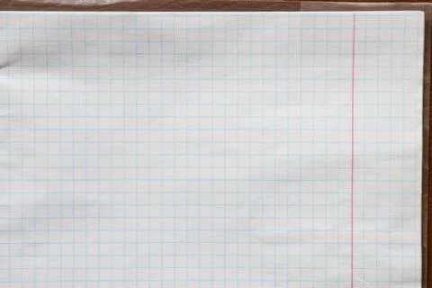 A close-up of a lined school notebook page as a background for study topics.. Stock Photos