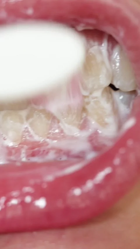 Close up of lips being exfoliated with a gentle scrub and brush Stock-Footage 343838145