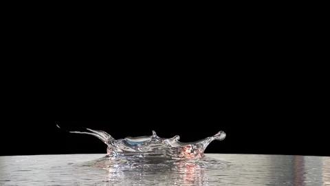 Close up of a Liquid Crown Splash in Slow Motion on perfect Black Stock Footage 345571056