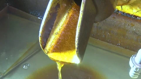 Close-Up of Liquid Sugar Flowing During Refining Process Stock Footage 342022918