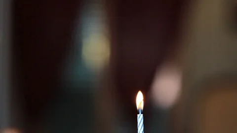Close up of lit candle Stock Footage 120067979