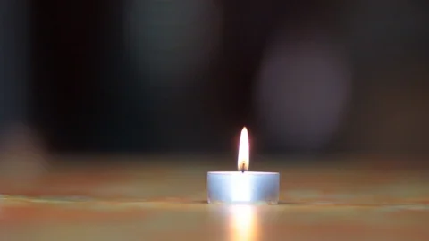 Close up of lit candle Stock Footage 120068007
