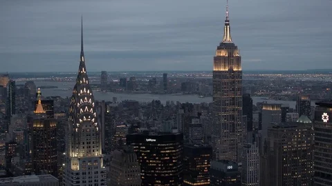 CLOSE UP: Lit up Empire State Building and Chrysler Building after the sunset Stock Footage 73099835