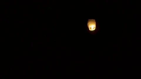 Close up of Lit Lantern agains dark background at night Stock Footage 124460787