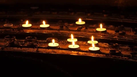 Close up of lit prayer candles in Bath Abbey 4k Stock-Footage 82524682