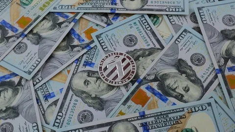 Close up of Litecoin cryptocurrency on the USD background Stock Footage 88226652