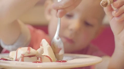 Close up of little boy enjoying ice-cream Stock Footage 72674572