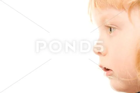Close-up of little redhead girls profile isolated over white background Stock Photos