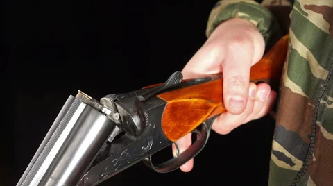Close up of loading and unloading hunting rifle Stock Footage 60637295