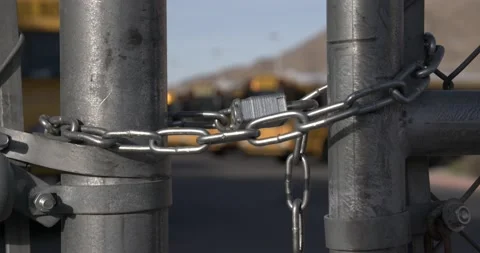 Close Up of a lock and chain on a Gate Stock Footage