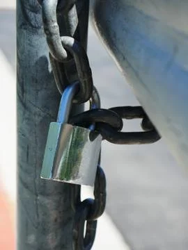 Close up of lock and chain on gate COVID-19 Stock Photos