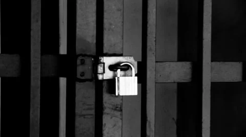 Close up of a lock in a grungy street Stock Footage 34556294