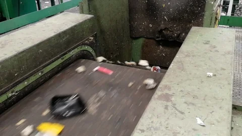 Close-up lockdown shot of garbage moving along conveyor belt, Lisbon, Portugal Stock Footage 114852130