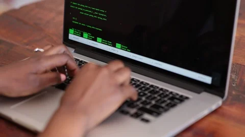 Close-up lockdown shot of hands of female freelancer programming on laptop Video stock 114859637