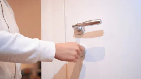 Close up locking door with key. white door. concept of safety and comfort. Stock Footage 220616288