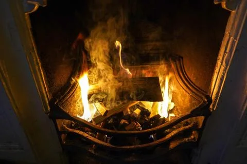 Close up of logs burning on a open fire 写真素材