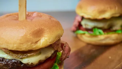Close-up look of a beef burger in 4K in slow-motion. Stock Footage 153762118